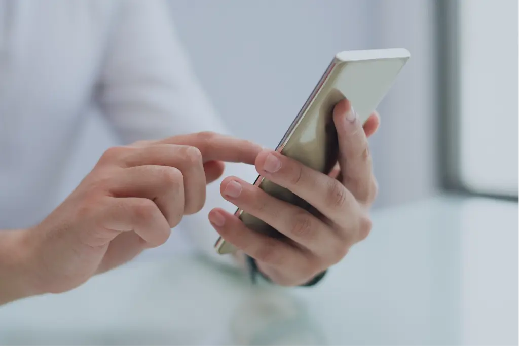 close-up-of-male-hands-using-smartphone 12